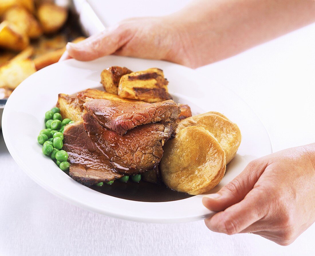 Roast beef with Yorkshire pudding and vegetables