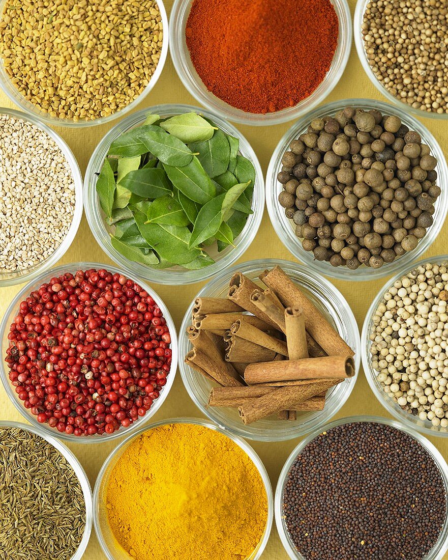 Various spices in small bowls (from above)