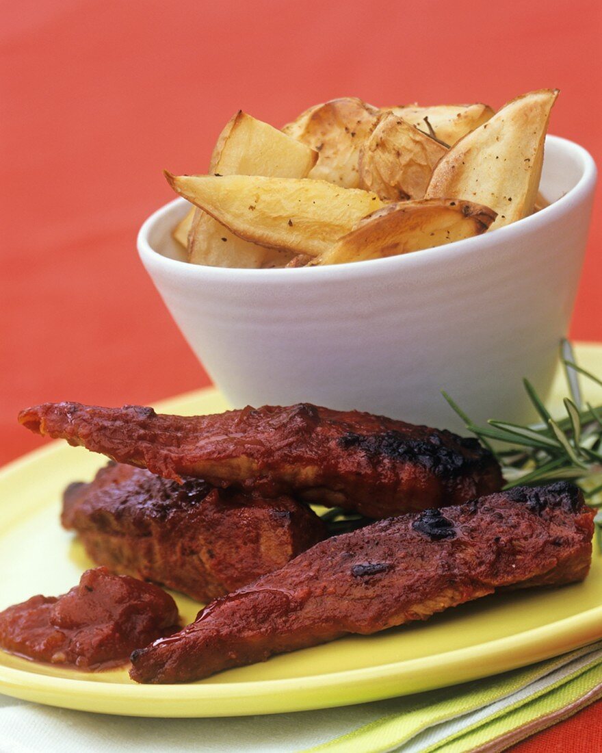 Schweinefleisch mit Mesquite-BBQ-Sauce und Potato Wedges