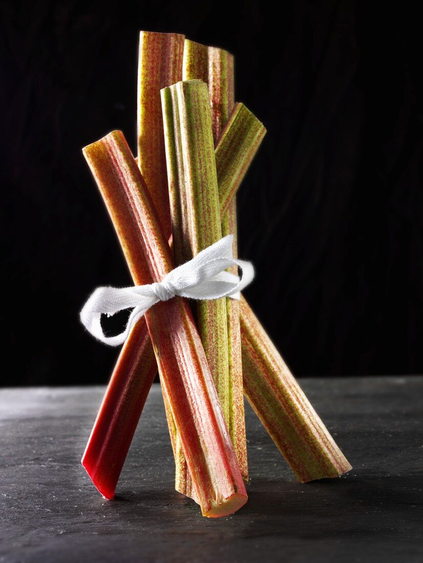 Sticks of rhubarb, tied together