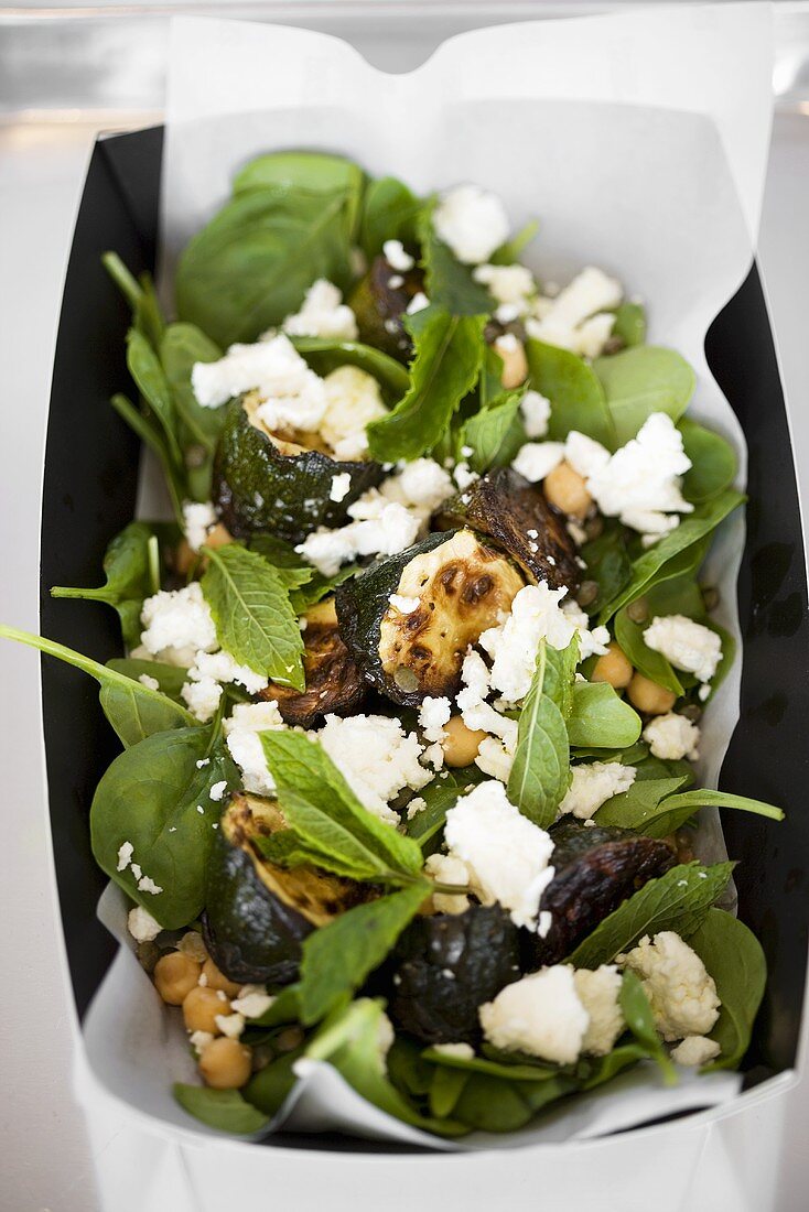 Grilled courgettes with spinach, goat's cheese & chick-peas