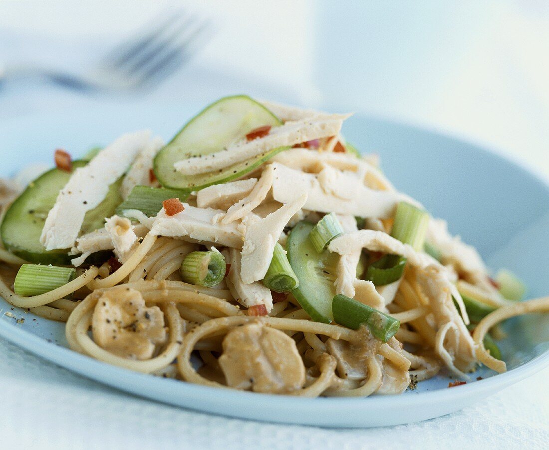 Pasta salad with chicken, mushrooms and vegetables