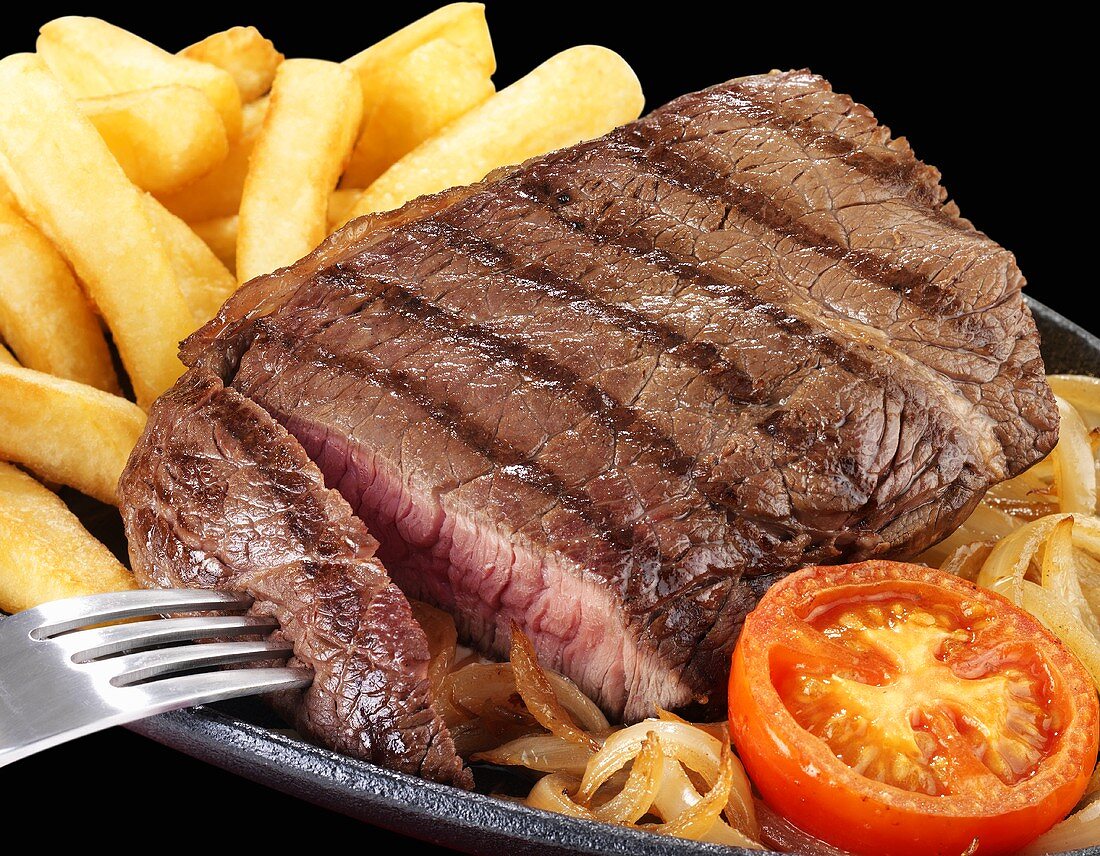 Rump steak with onions and chips