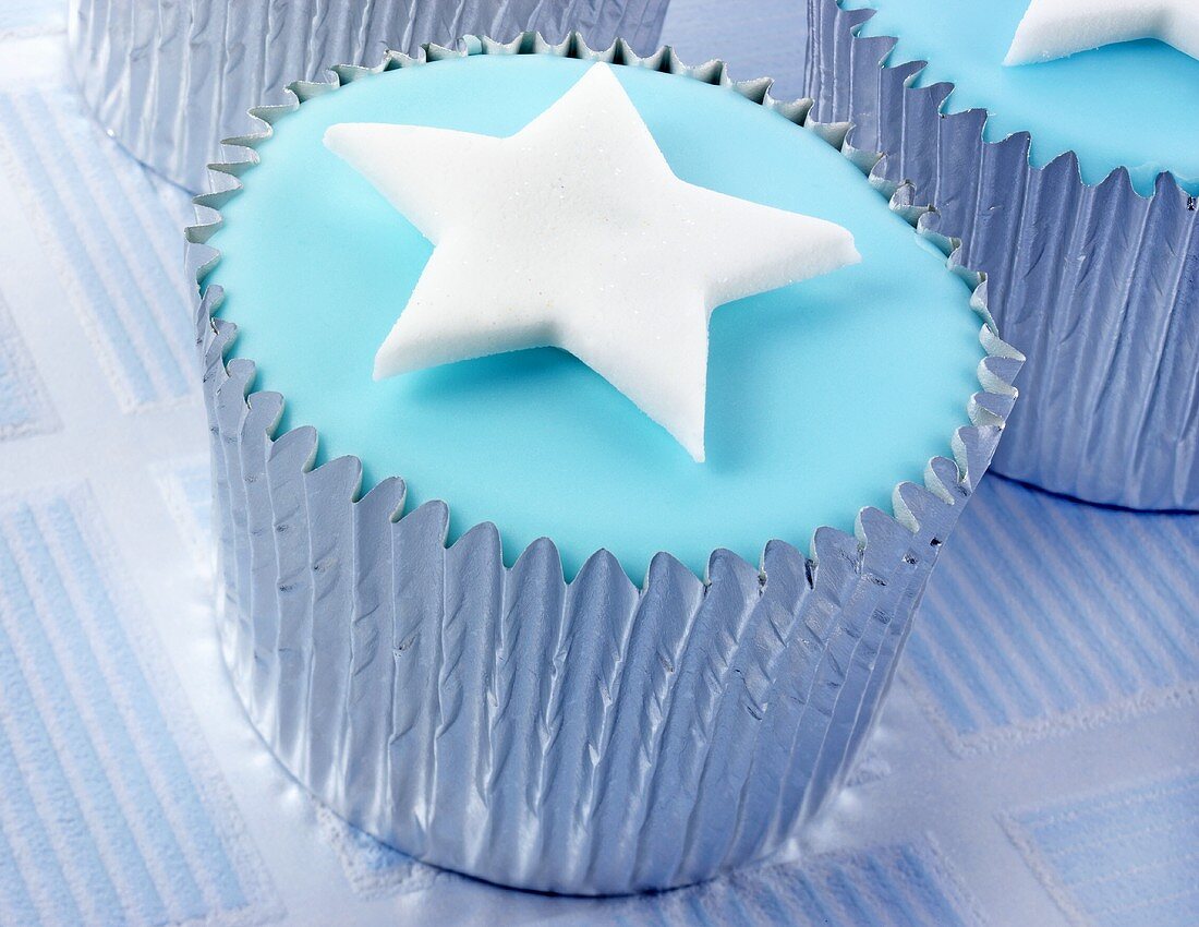 Cupcake with blue icing and star