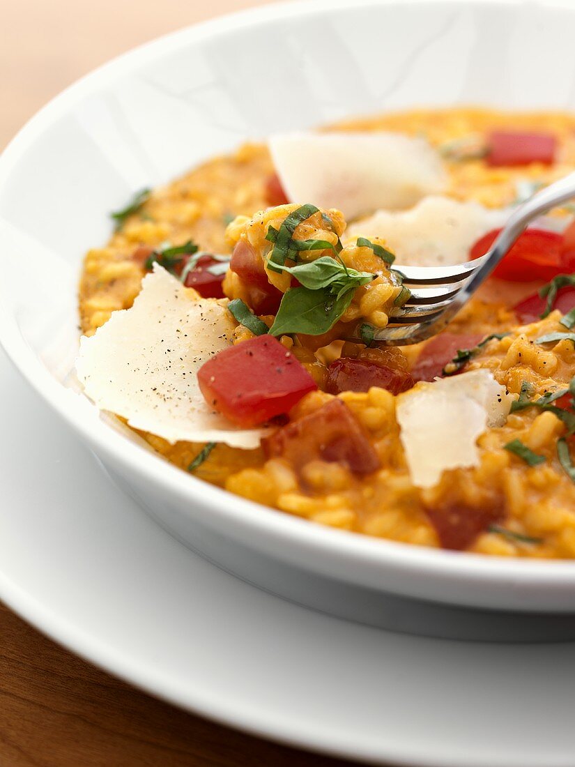 Tomato risotto with basil and Parmesan
