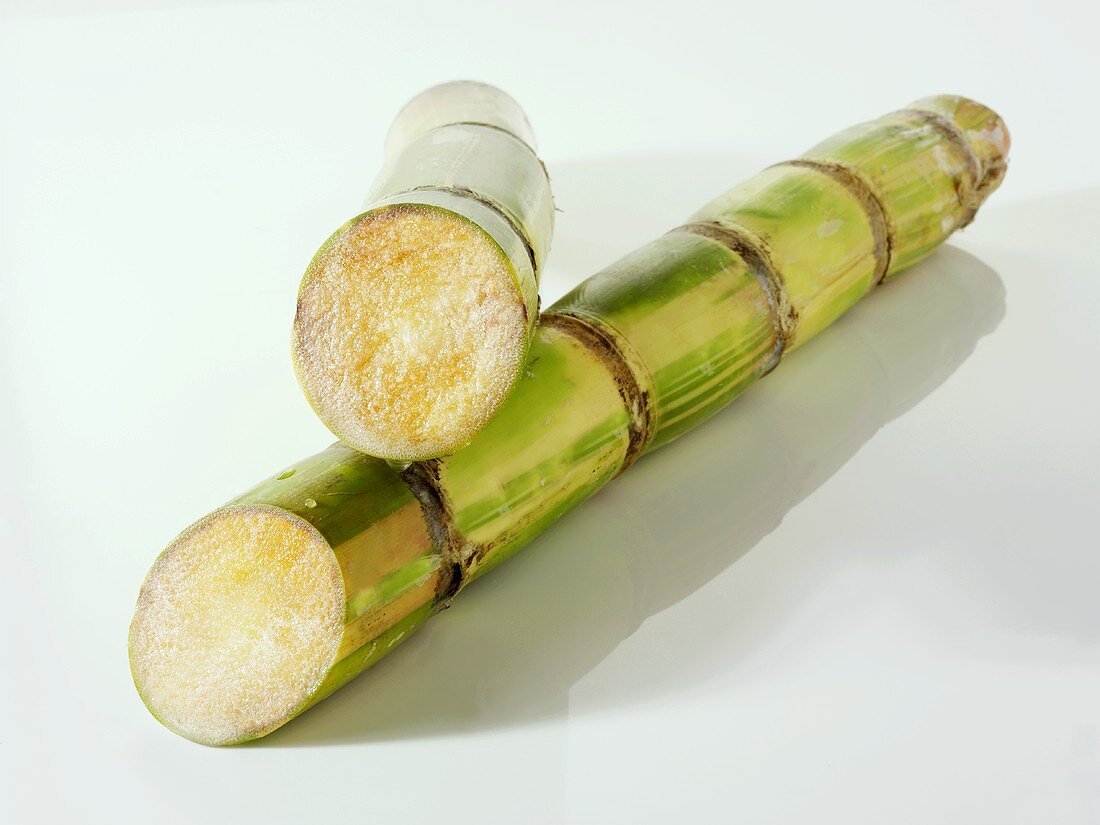 Sugar cane, cut into two pieces