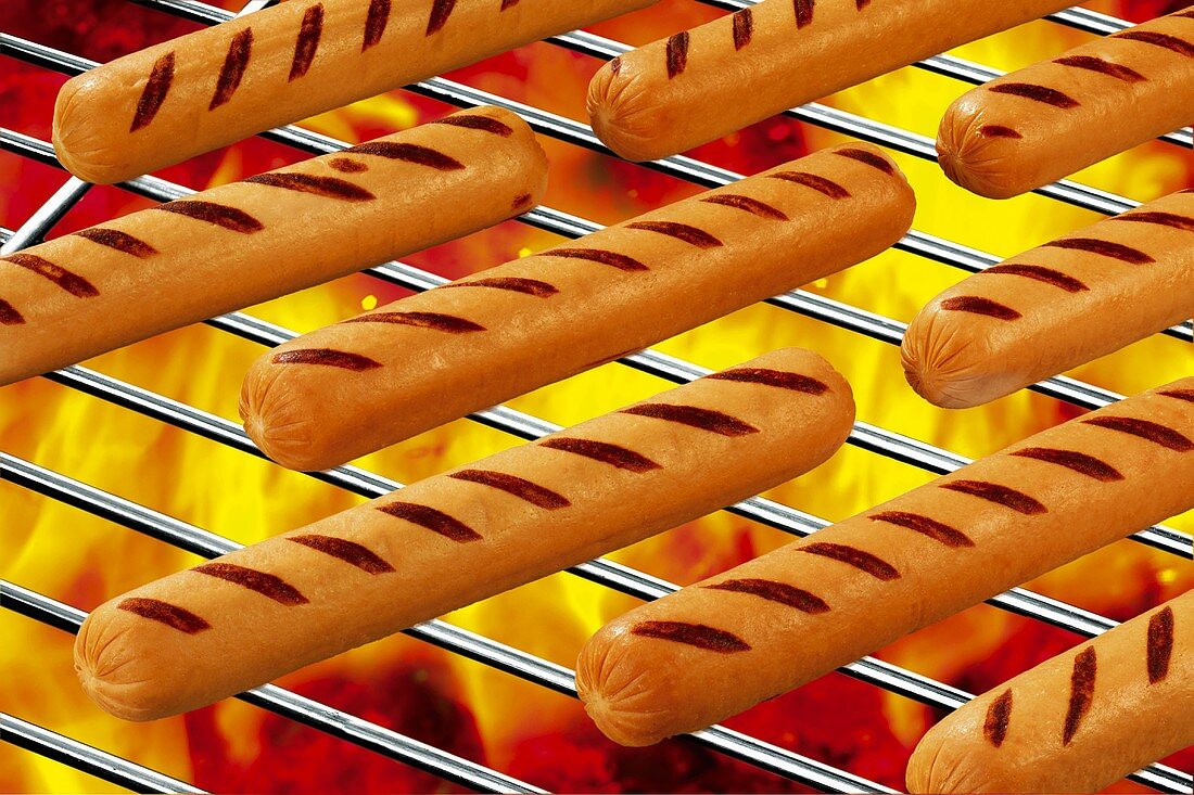 Hot dog sausages on barbecue