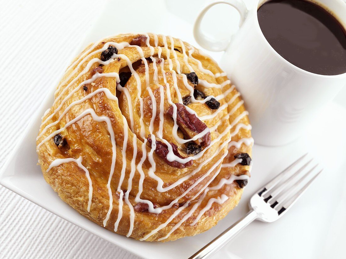 Fruity Danish pastry with a cup of coffee