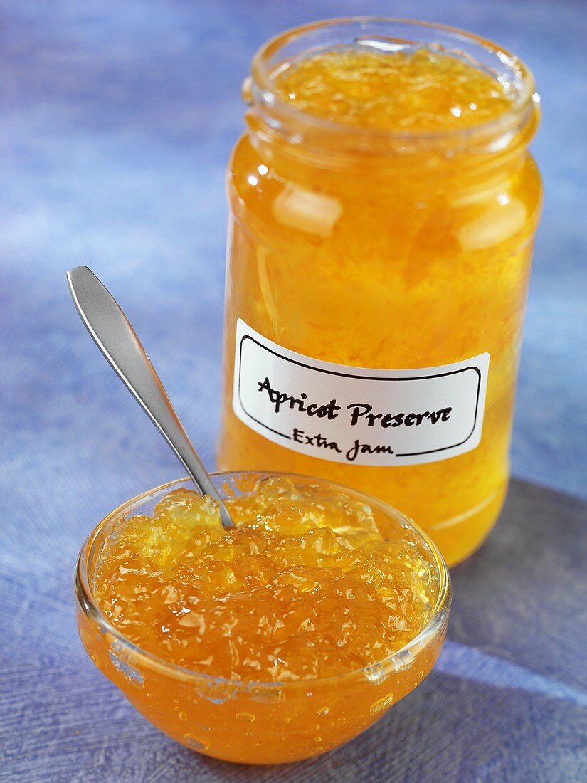 Apricot preserve in jar and small dish