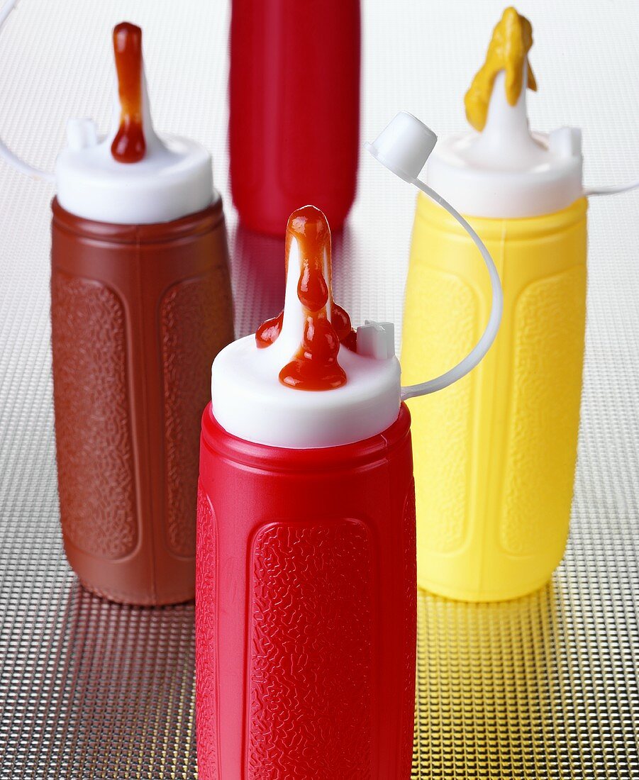 Ketchup and mustard in plastic bottles