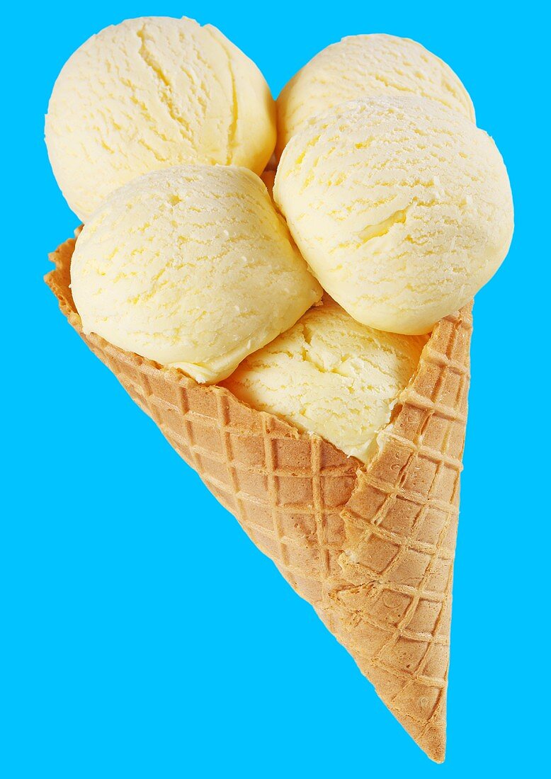 Five scoops of vanilla ice cream in a waffle cone