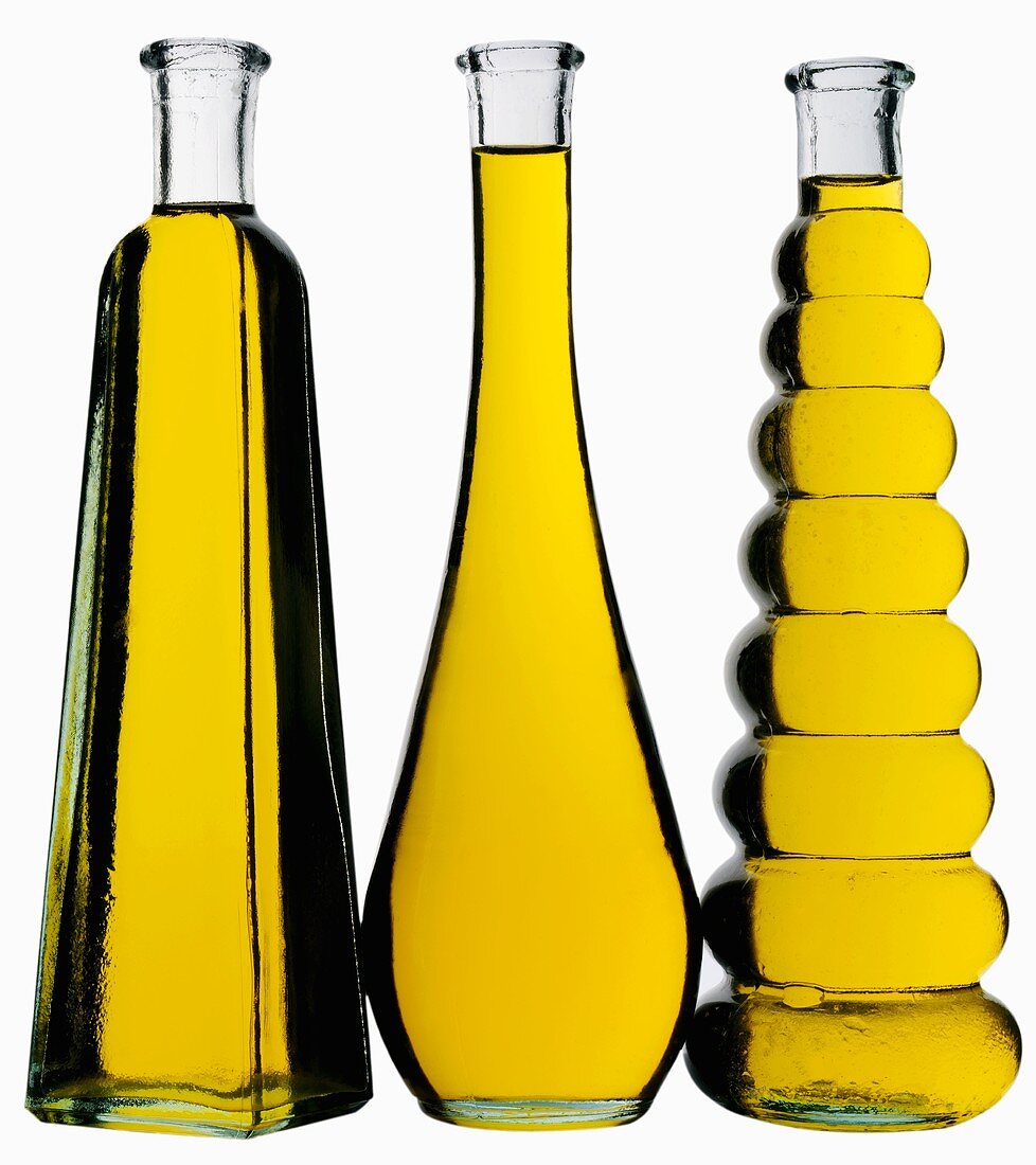 Olive oil in three bottles