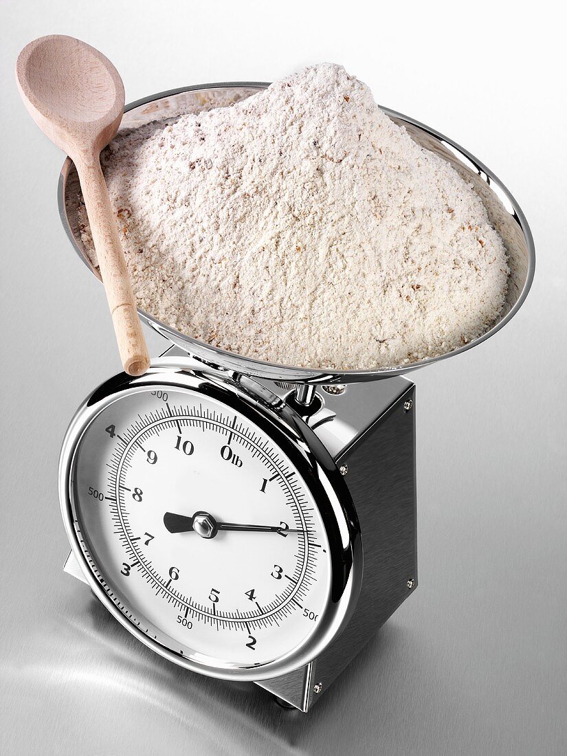 Wholemeal flour on kitchen scales