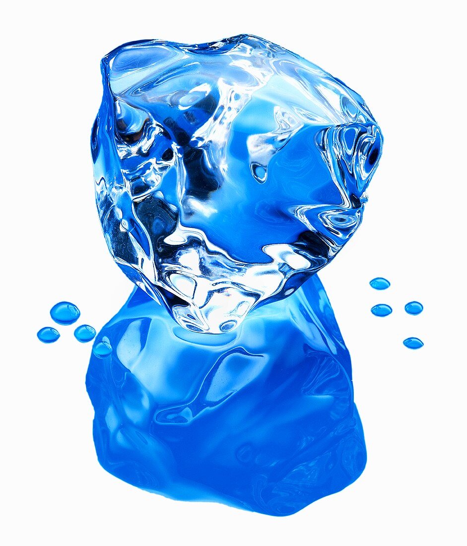 A blue ice cube with reflection