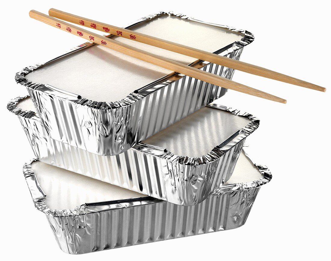 Three aluminium take-away containers with chopsticks