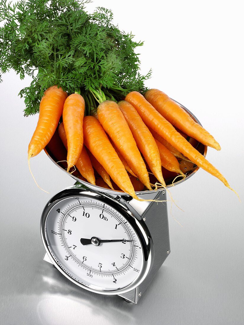 Carrots on kitchen scales