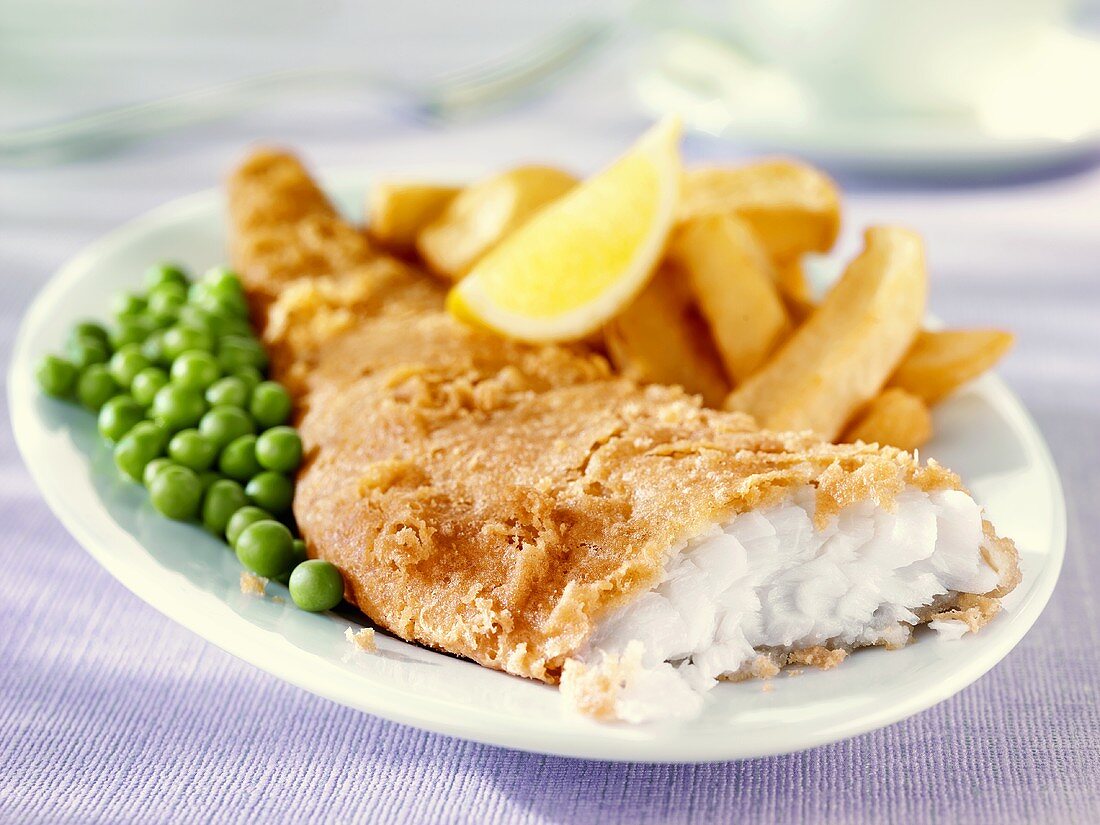 Battered haddock with chips and peas