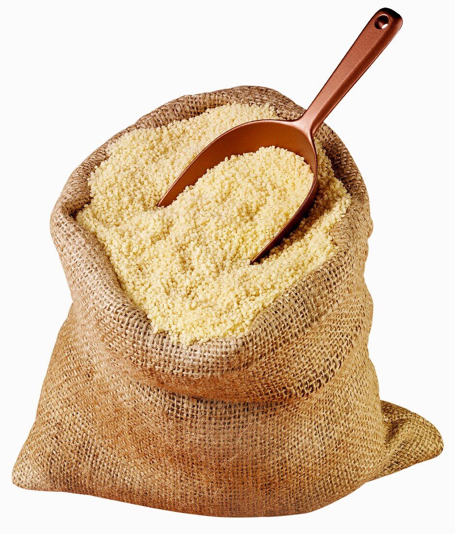 Couscous in jute sack with scoop