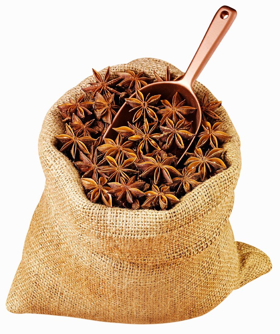 Star anise in jute sack with scoop