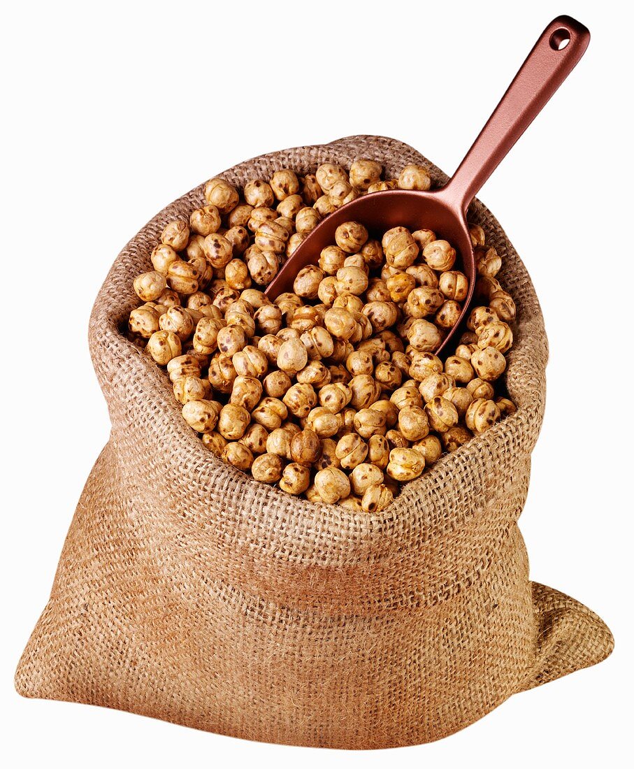 Roasted chick-peas in jute sack with scoop