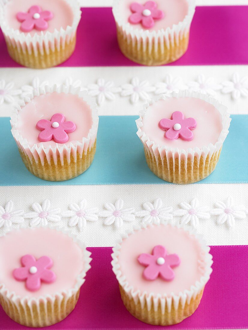 Pink cupcakes with sugar flowers