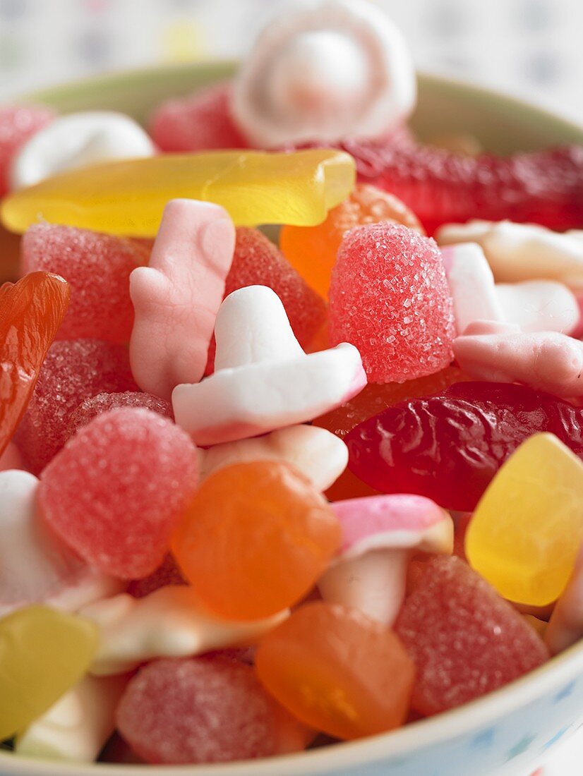 Fruit jelly sweets and marshmallows in a small bowl