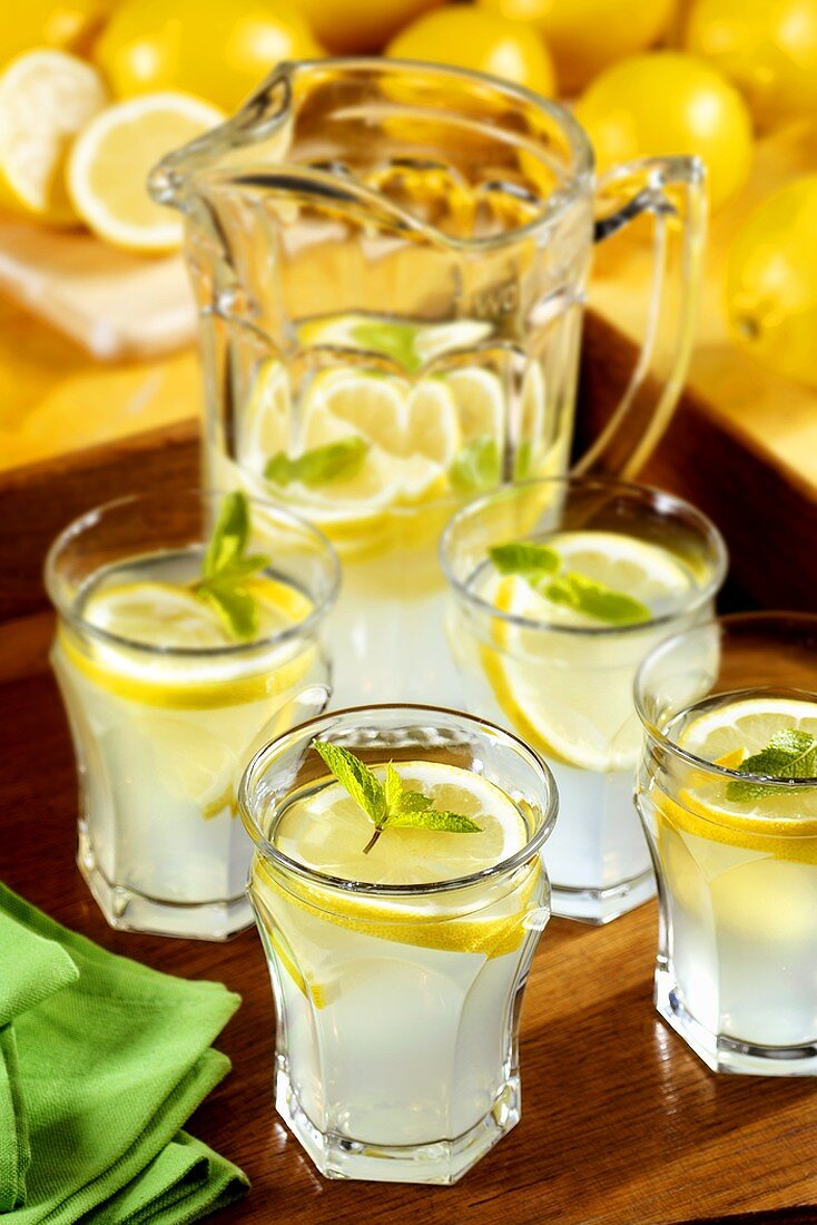 Lemonade in jug and glasses