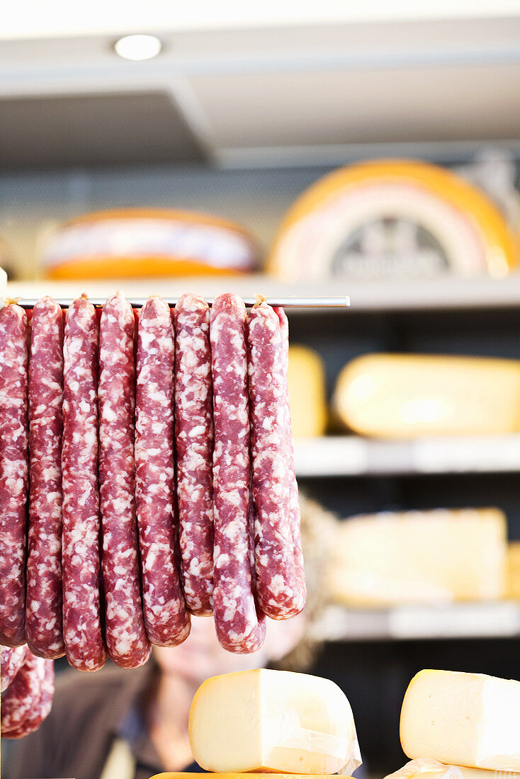 Salami and cheese on a market stall in Belgium