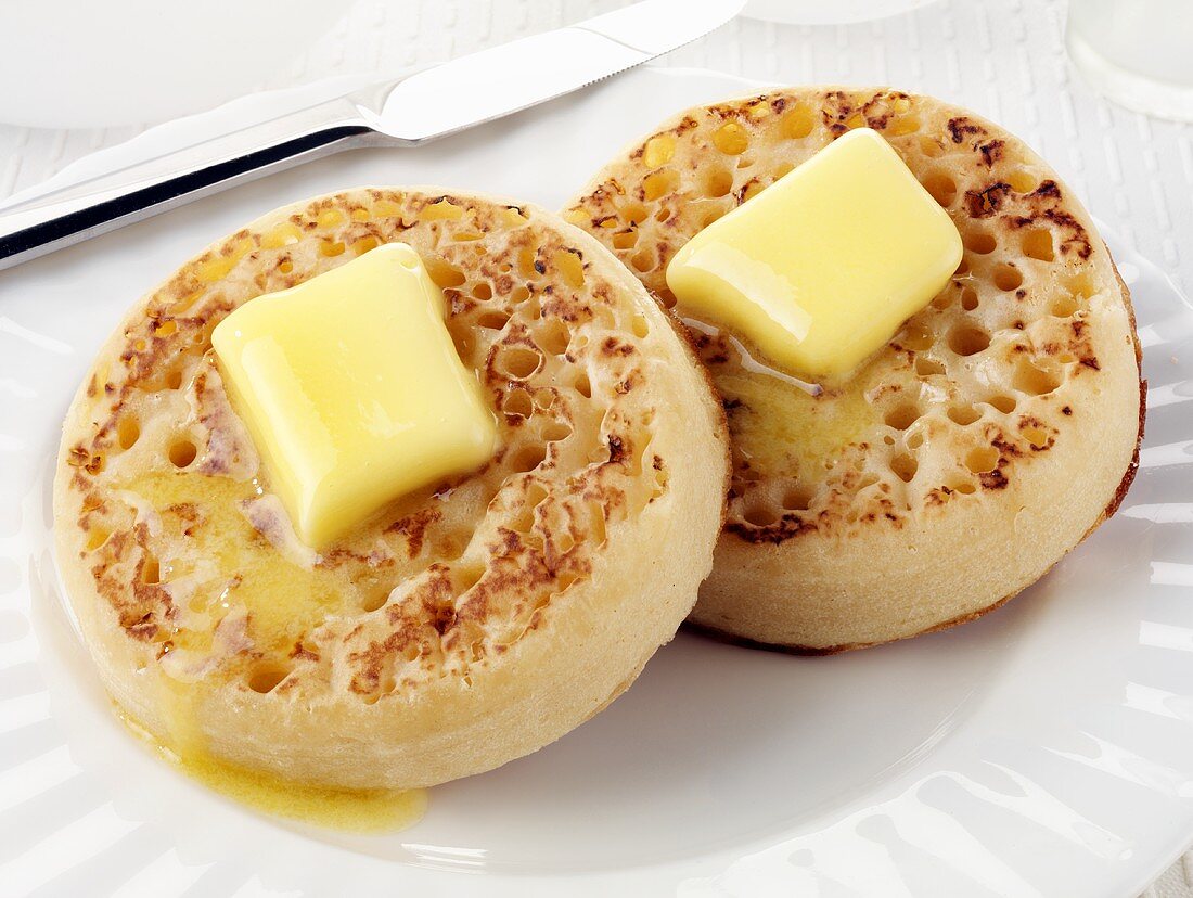 Two crumpets with butter
