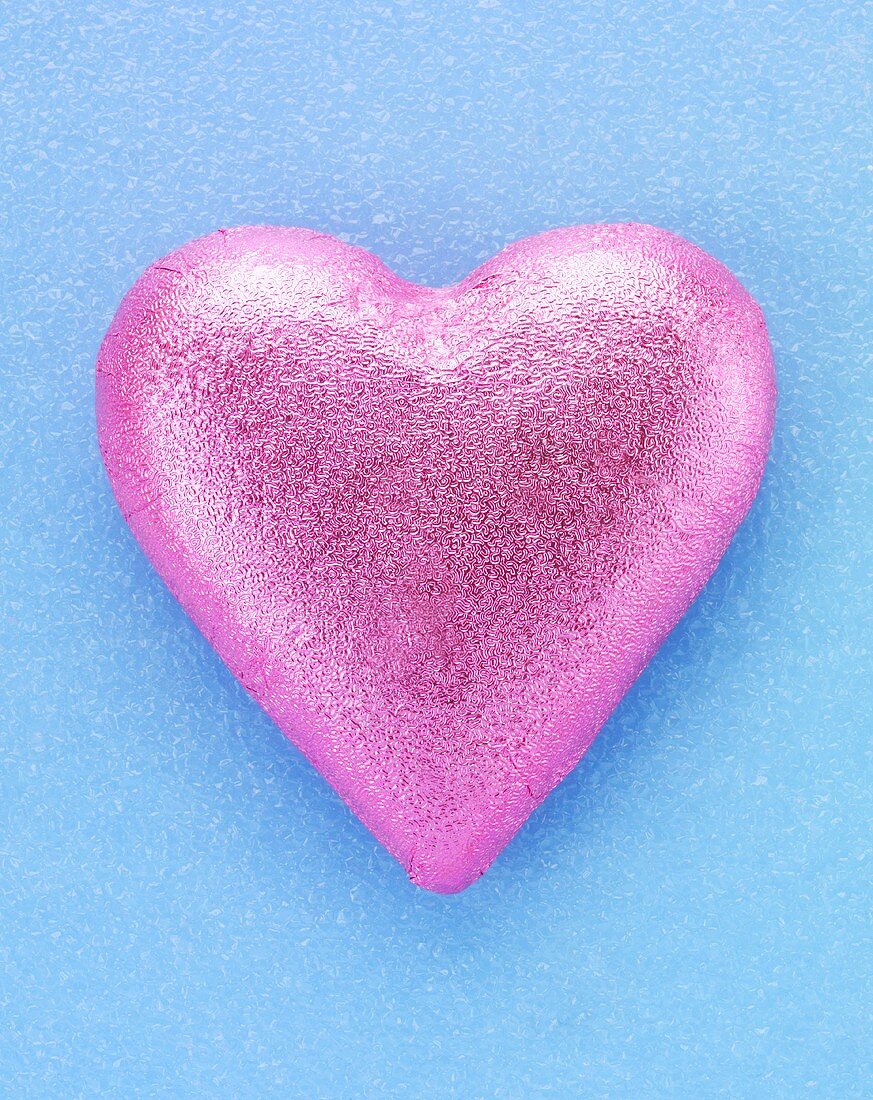 Chocolate heart in pink foil