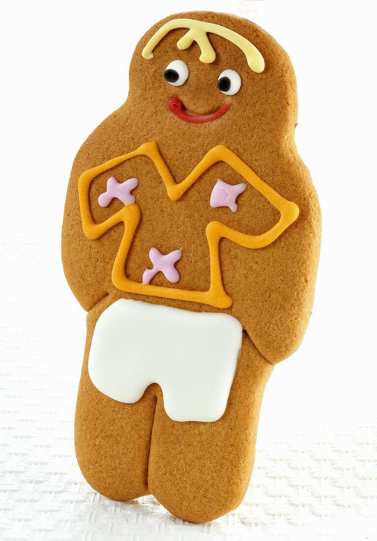 A gingerbread man decorated with icing