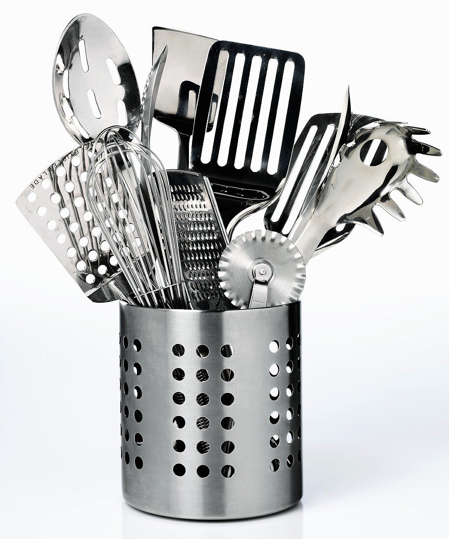 Various kitchen tools in a metal container