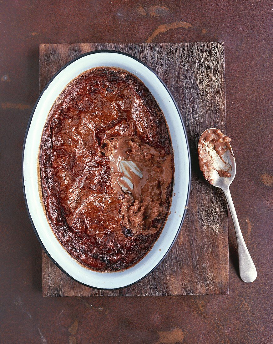 Oven-baked chocolate rice pudding in a baking dish