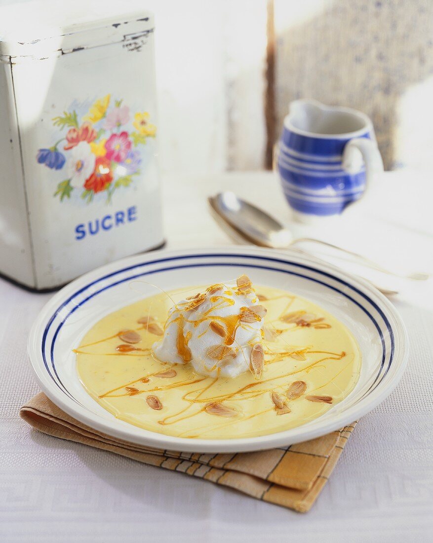 Poached meringue with custard, caramel and almonds