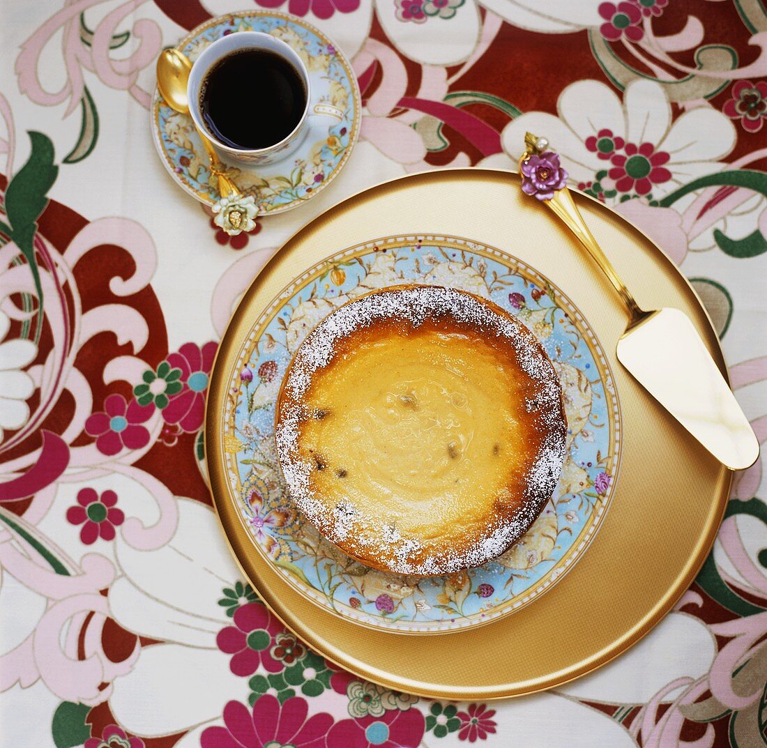 Passion fruit cheesecake with a cup of coffee