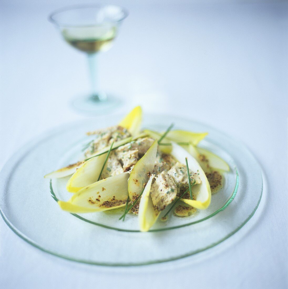 Chicken salad with mustard dressing on chicory
