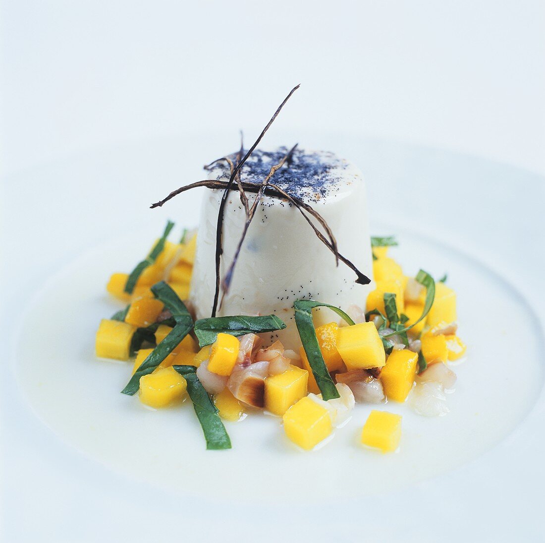 Panna cotta with lychee and mango salad