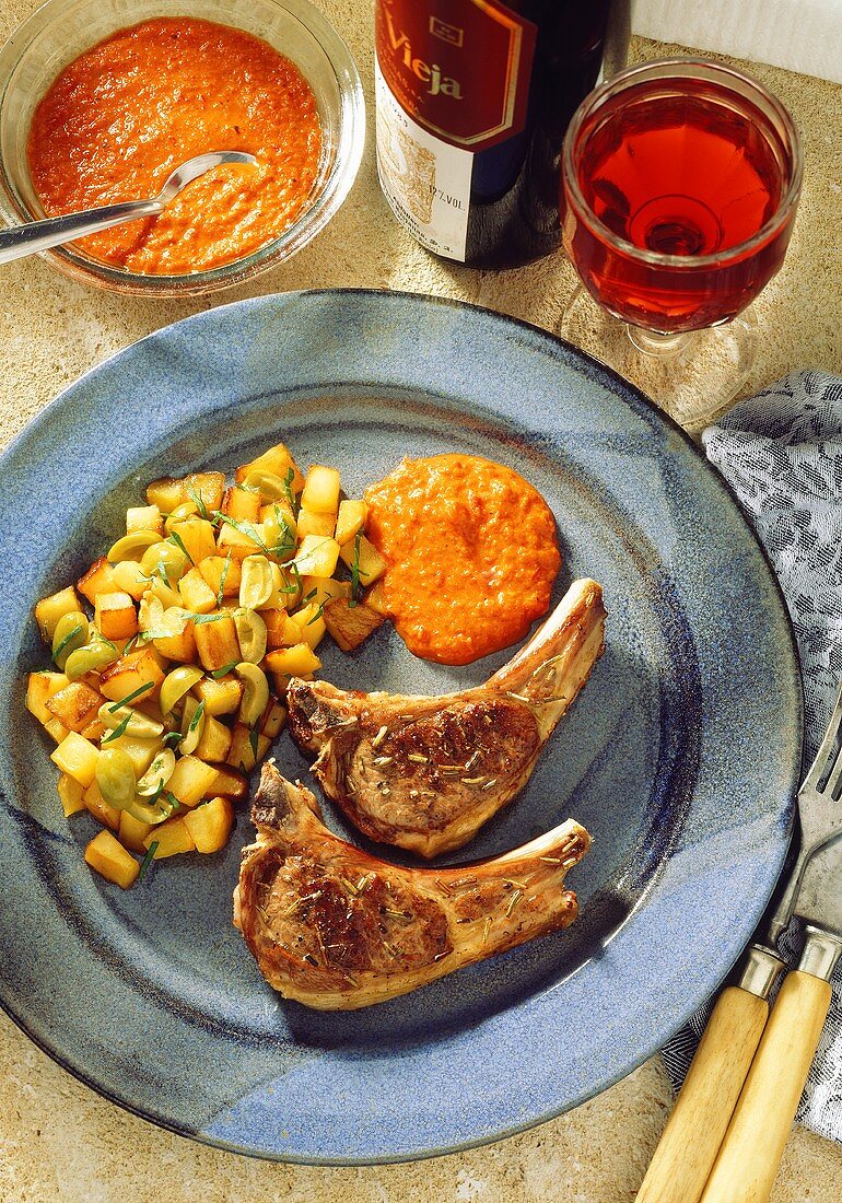 Lamb cutlets with olive potatoes