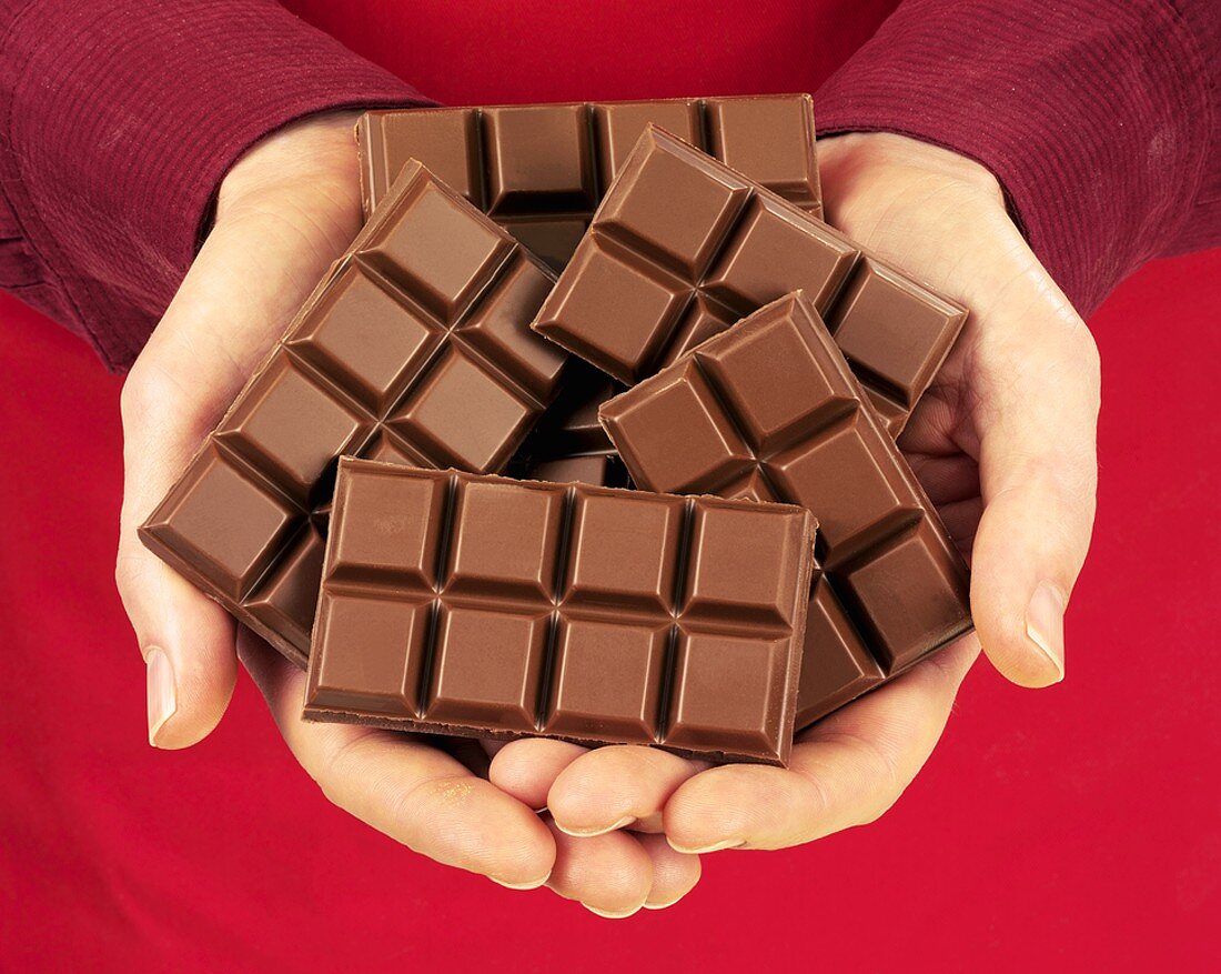 Hands holding chocolate