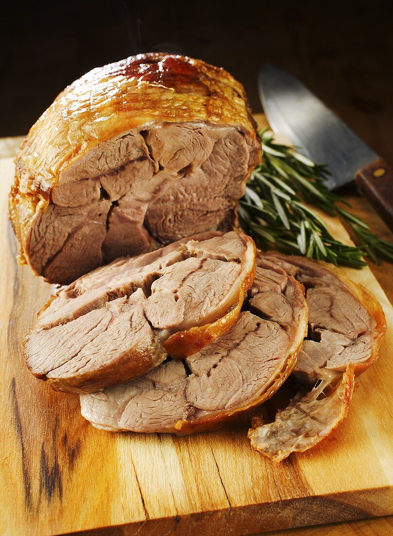 Roast leg of lamb, slices carved