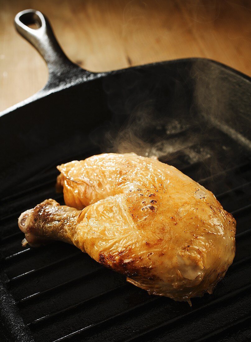 Chicken leg in grill pan