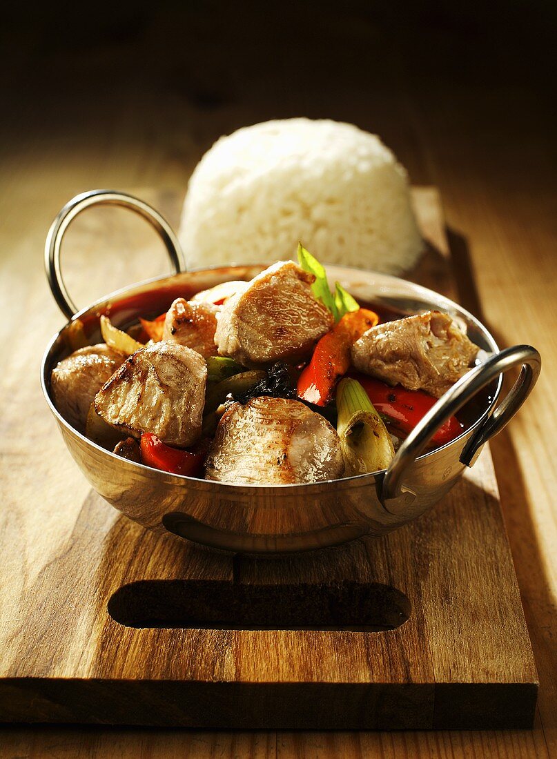 Pork with peppers and spring onions, rice