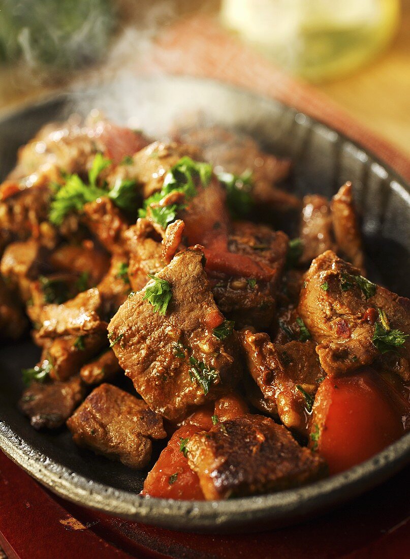 Spicy lamb stew with tomatoes