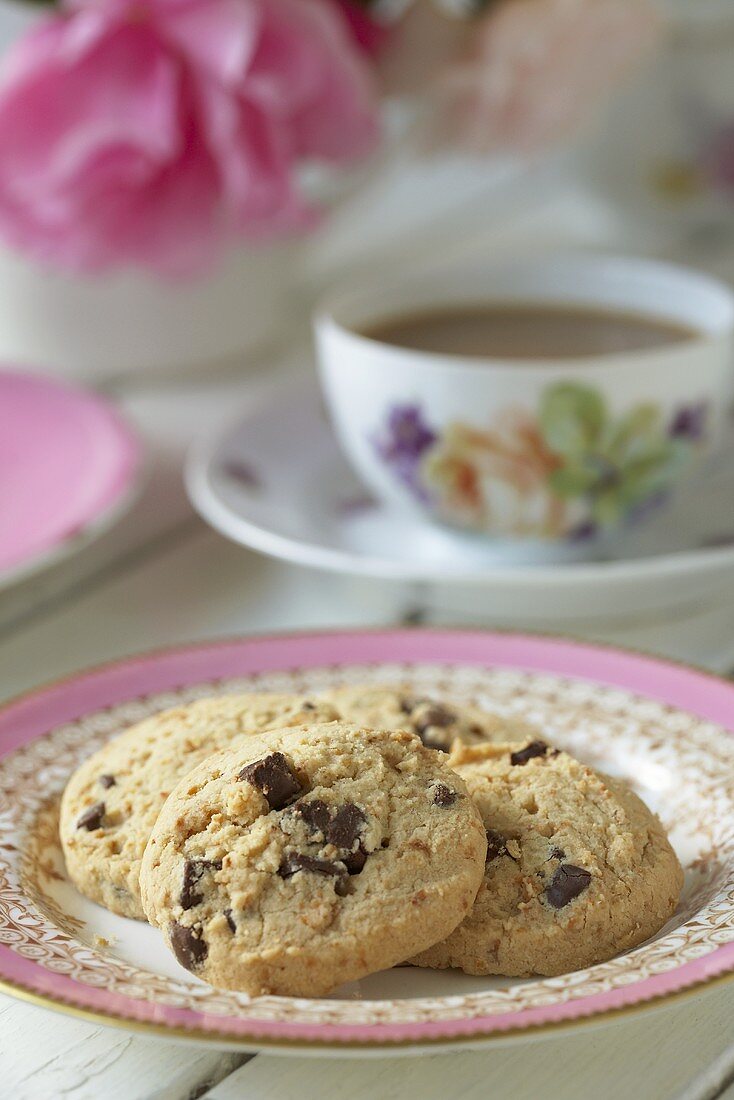 Chocolate chip and coconut biscuits with tea
