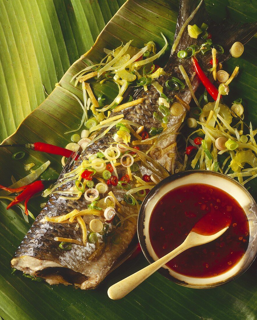 Pla Pah Sah (fish fillet steamed in banana leaves, Thailand)