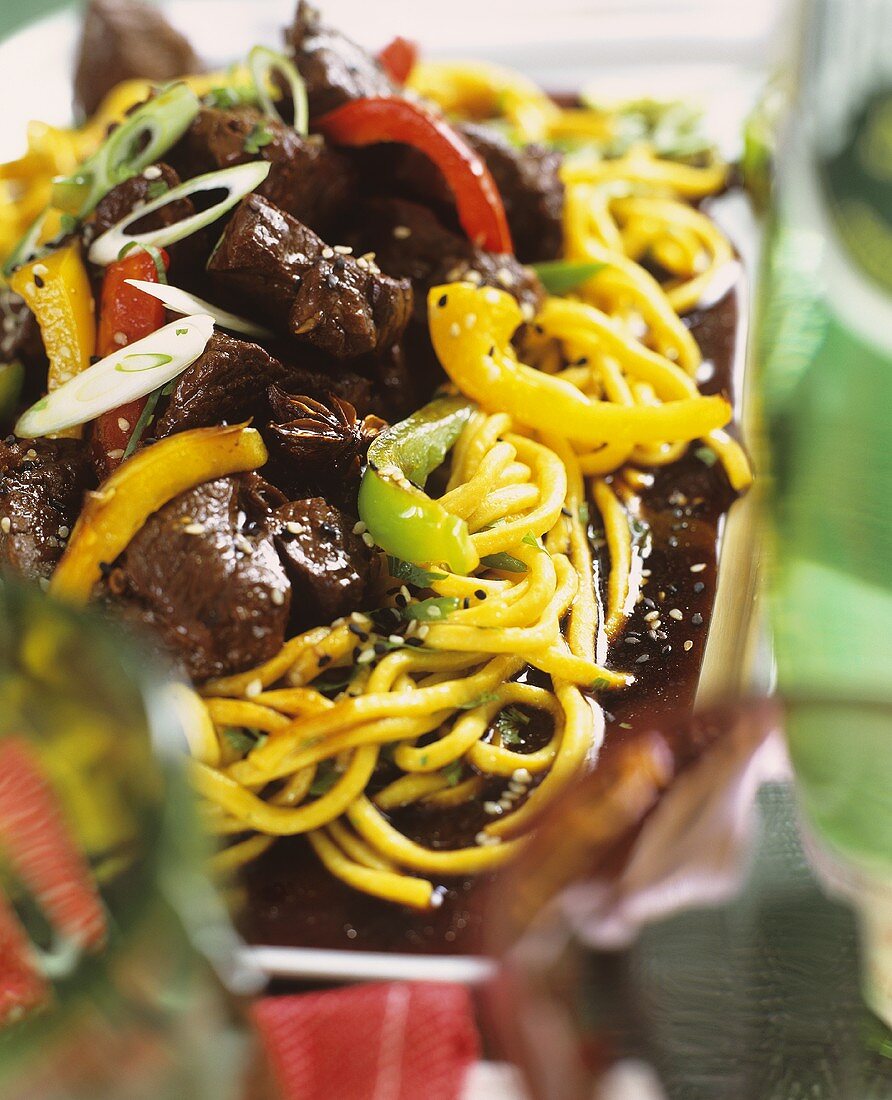 Beef and vegetables with sesame and egg noodles