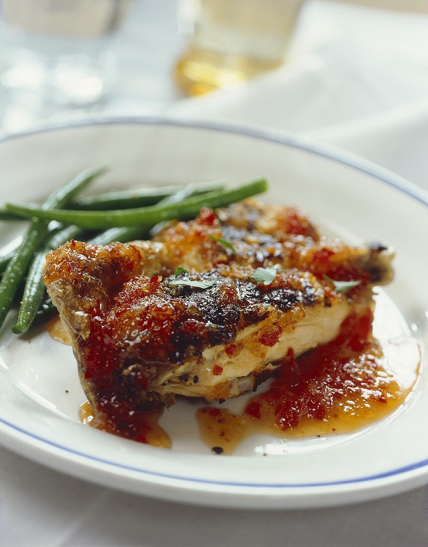 Grilled poussin with chilli marmalade