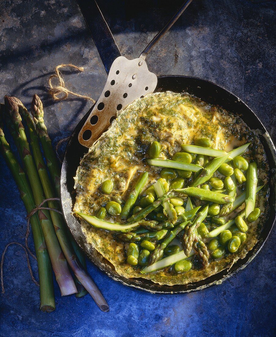 Omelette with asparagus and broad beans