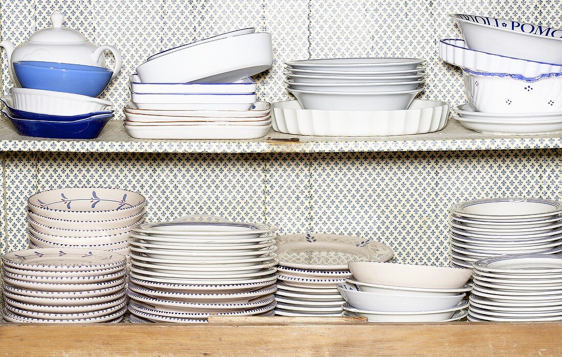 Crockery in kitchen cupboard