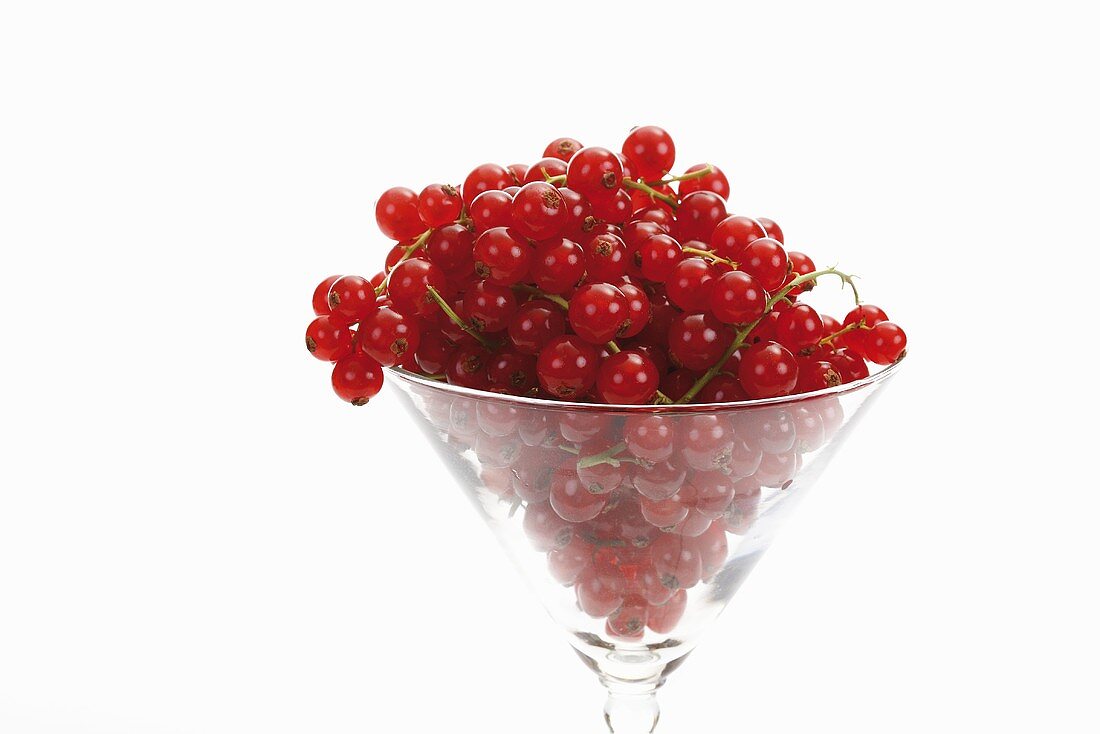 Fresh redcurrants in a glass